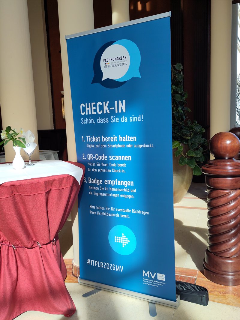 Foto eines Check-In Aufstellers im Kongresszentrum